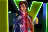 Jaden Smith Bursts With Color in Rainbow Raincoat & New Balance Sneakers for Nylon House in the Desert 2023 During Coachella